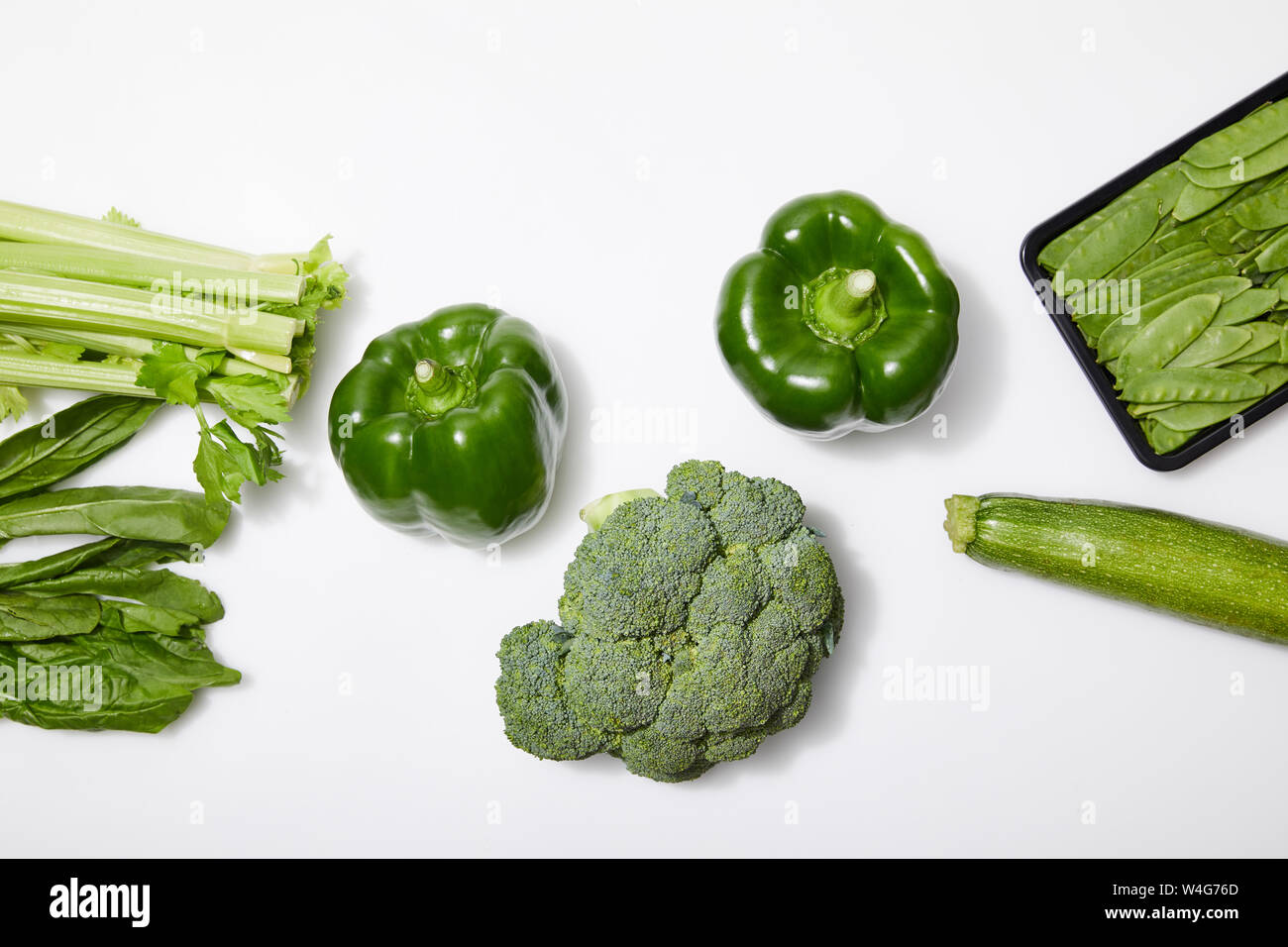 top view of green organic vegetables on white background Stock Photo ...
