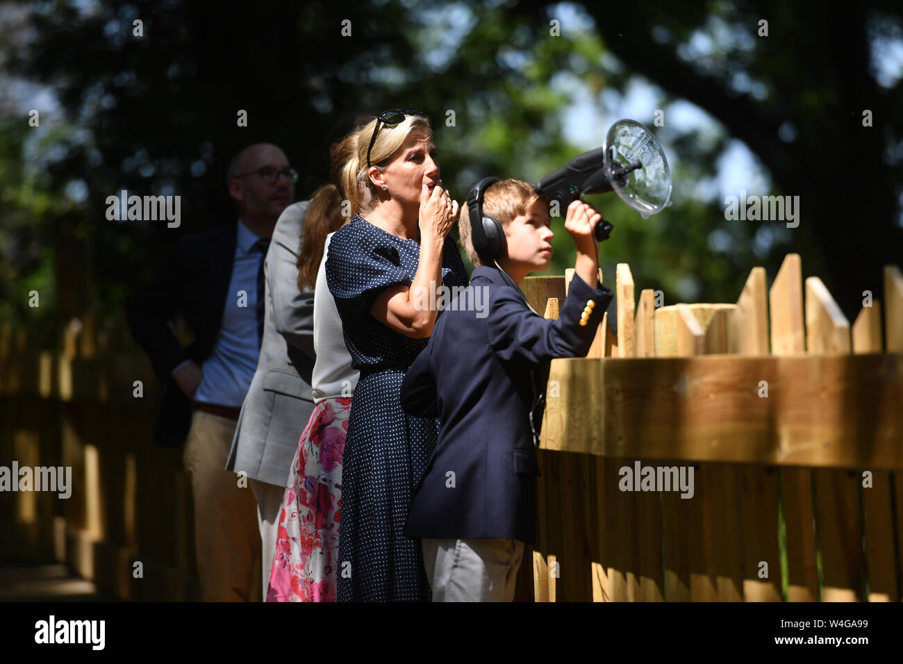 The Countess of Wessex, with her son, James, Viscount Severn listening to animals with a parabolic microphone during a visit to Bear Wood at Wild Place Project in Bristol. Stock Photo