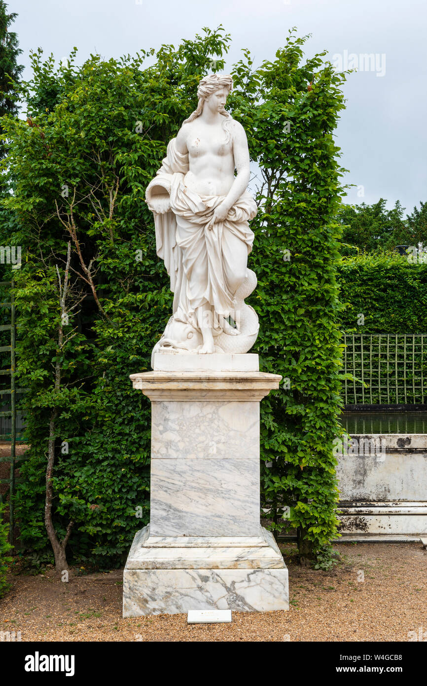 L'Eau statue (by Pierre Legros) next to Daybreak Fountain - Palace of Versailles Gardens, Yvelines, Île-de-France region of France Stock Photo