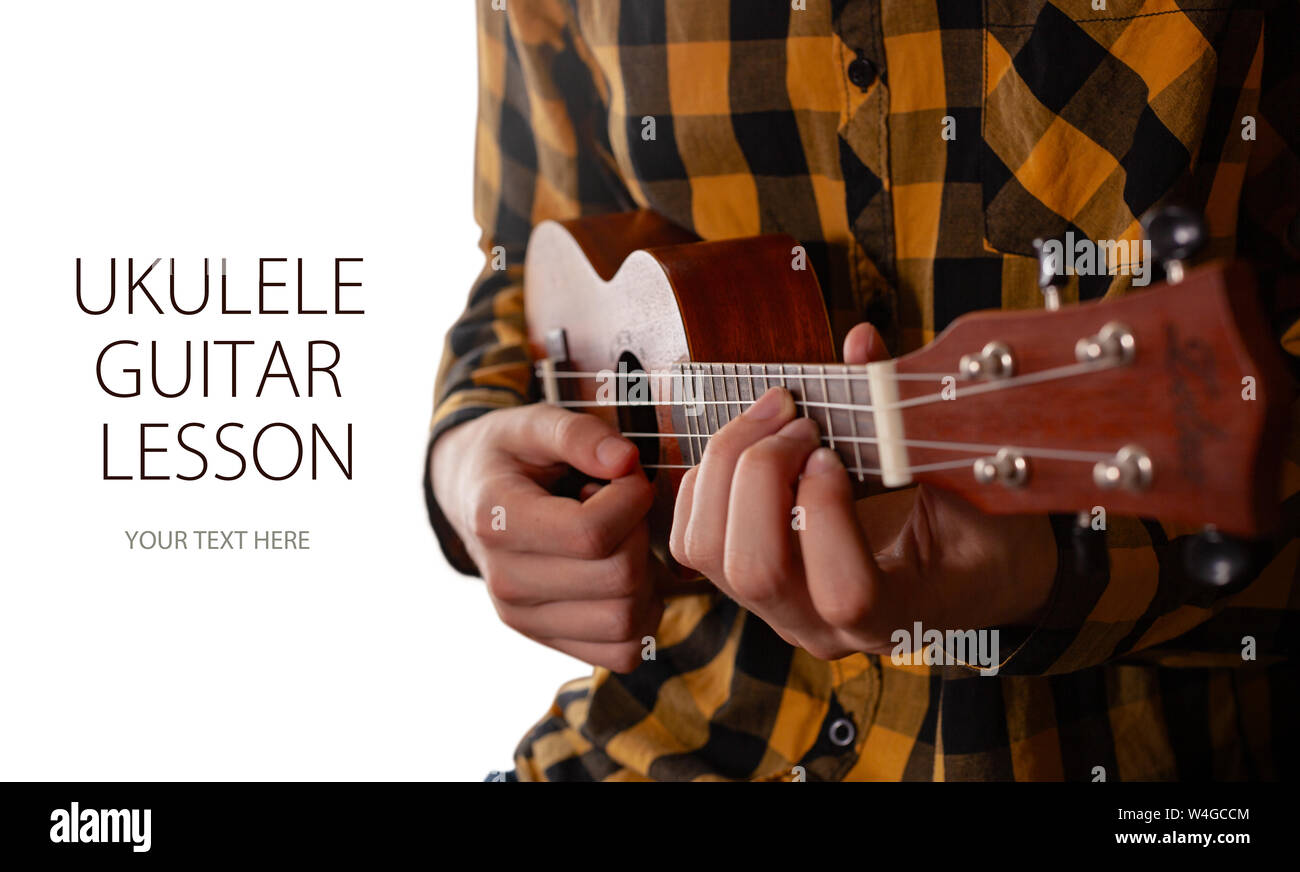 A man playing ukulele in close up view. Template design with sample text Stock Photo