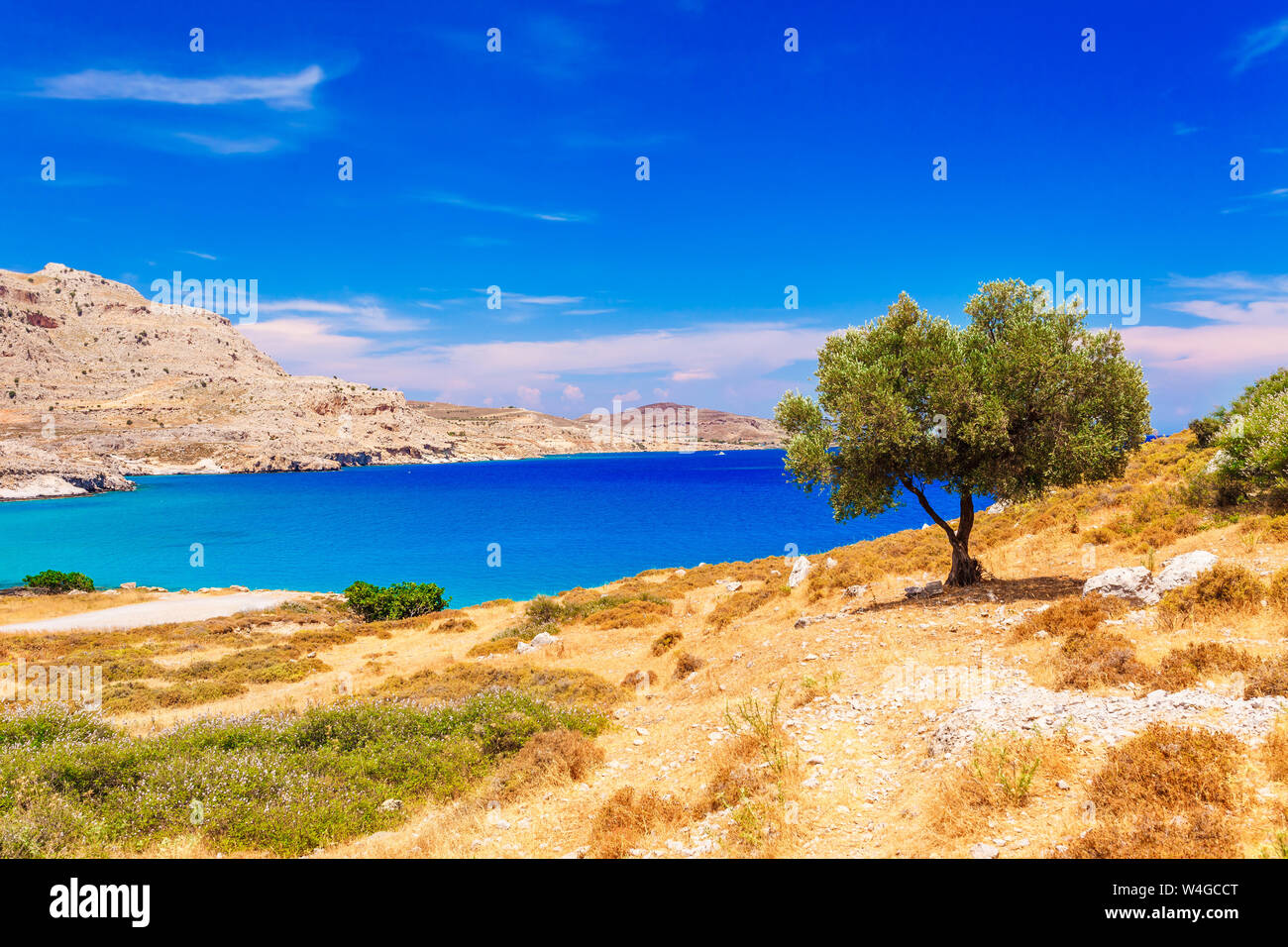 Sea skyview landscape photo near of Agia Agathi beach and Feraklos castle on Rhodes island, Dodecanese, Greece. Panorama with sand beach and clear blu Stock Photo