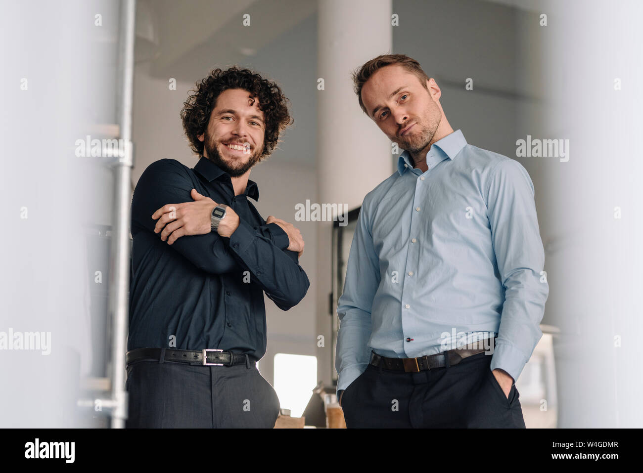 Business partners in a coffee shop waiting for customers Stock Photo
