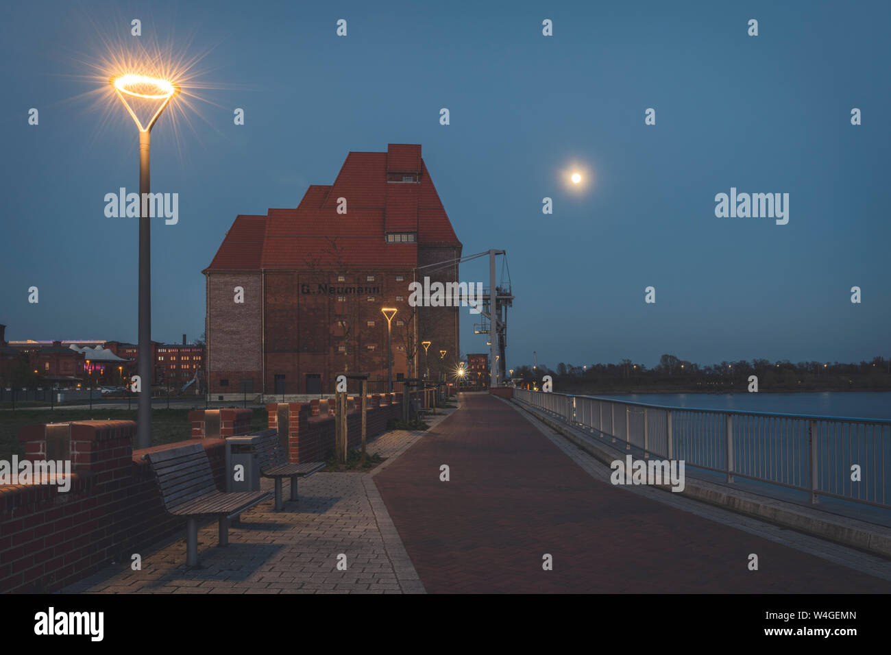 Waterfront promenade with okd warehouse at night hires stock photography and images Alamy