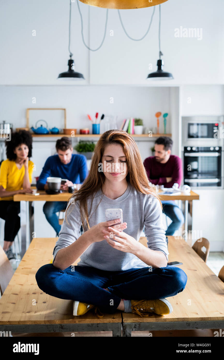 Sitting at dining table hi-res stock photography and images - Alamy