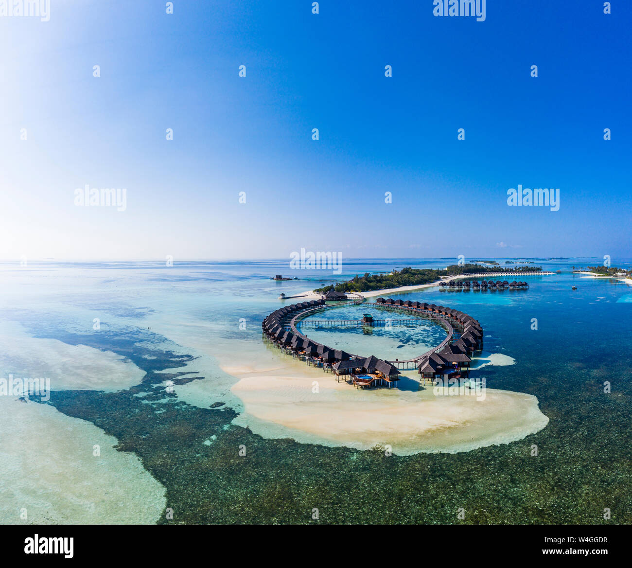 Aerial view over Olhuveli with water bungalows, South Male Atoll, Maldives Stock Photo