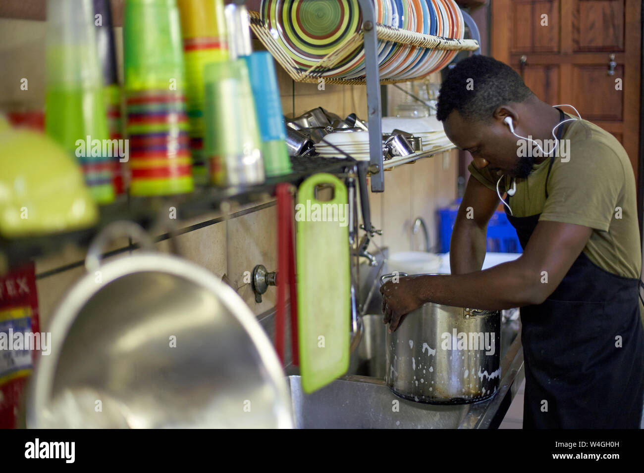 Man washing dishes Stock Photo - Alamy