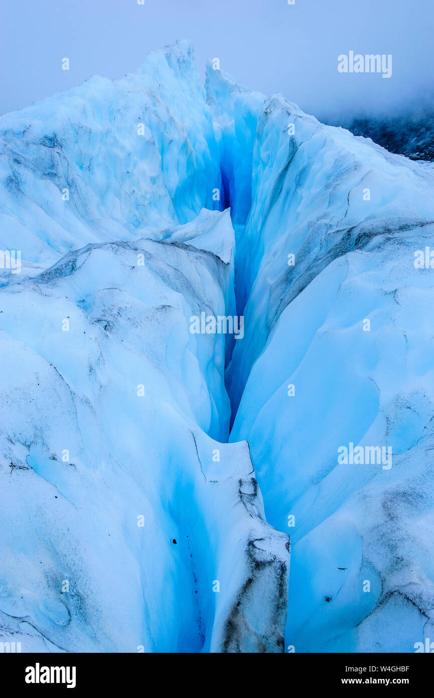 Huge ice cracks in Fox Glacier, South Island, New Zealand Stock Photo