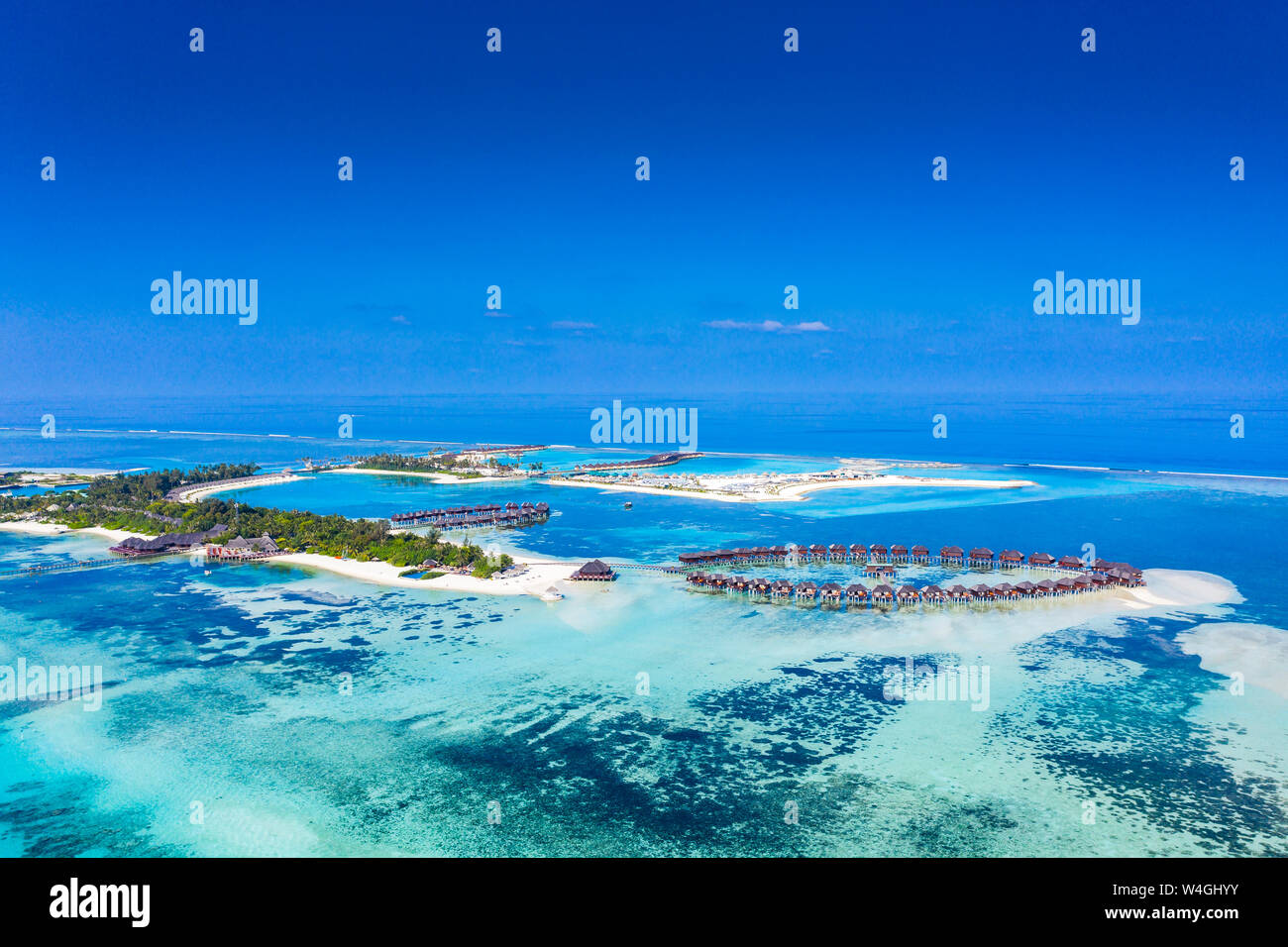 Aerial view over Olhuveli and Bodufinolhu with Fun Island Resort, South Male Atoll, Maldives Stock Photo