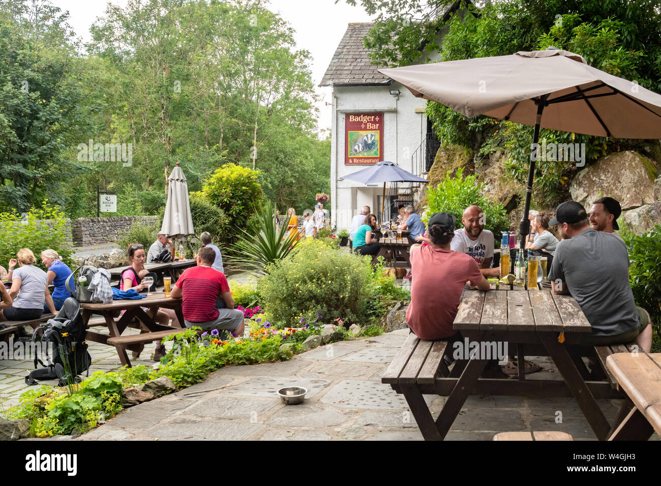 Badger Bar Inn and restaurant beer garden in summer, Glen Rothay B&B, Rydal, Ambleside, Cumbria, Lake District, England, UK Stock Photo