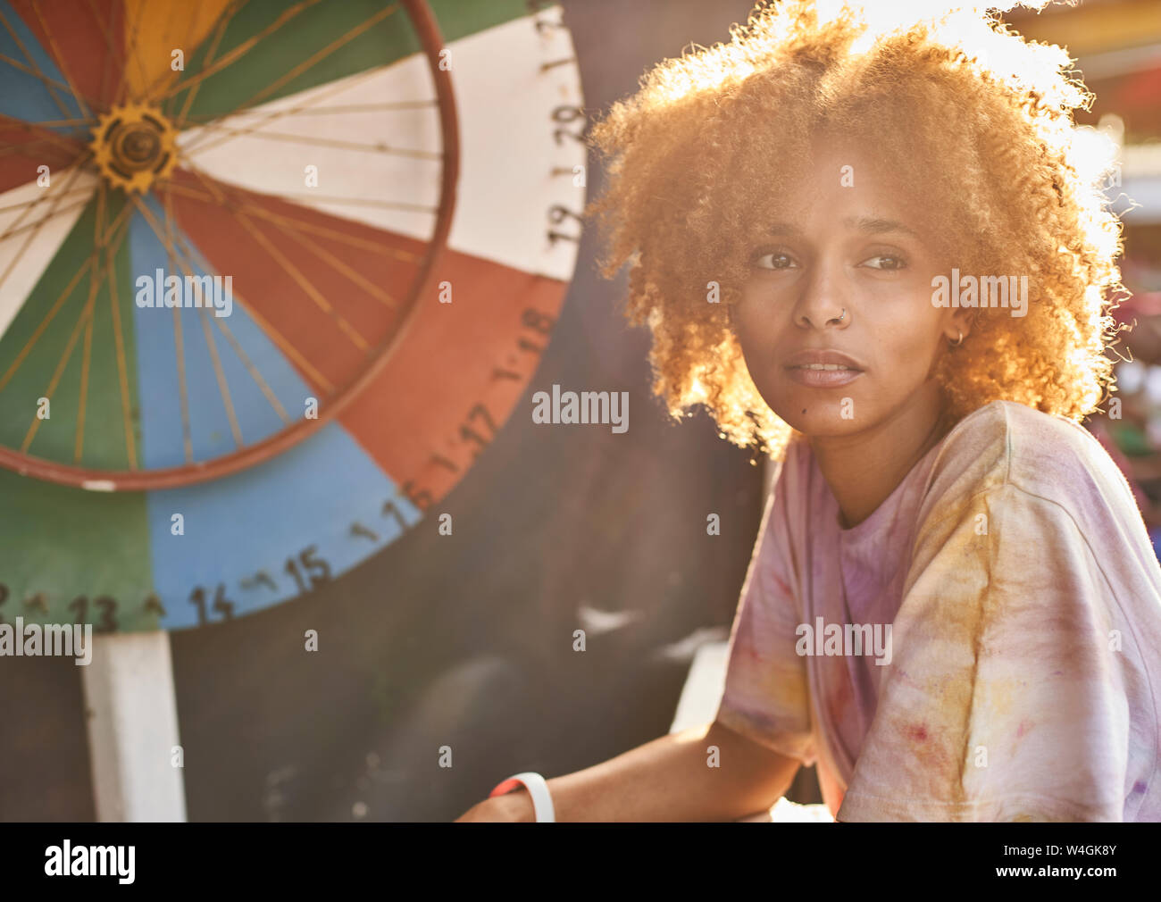 Woman at a wheel of fortune Stock Photo