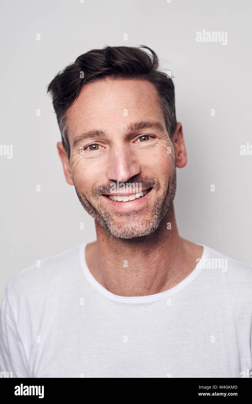 Portrait of man wearing white t-shirt Stock Photo