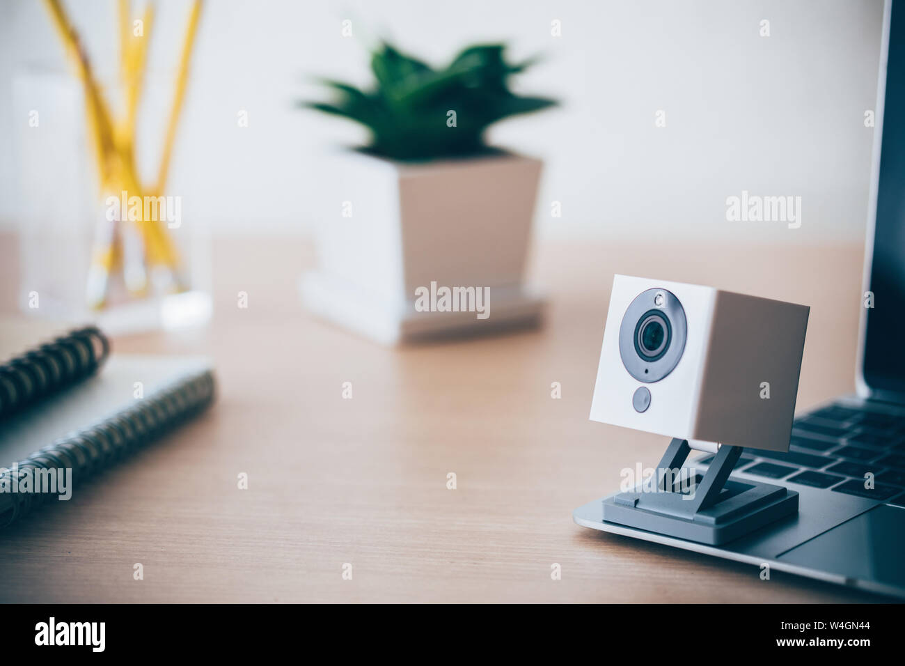 Security camera on Wood table. IP Camera. Stock Photo