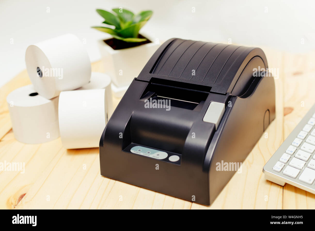 Office equipment, A point of sale receipt printer printing a receipt Stock Photo