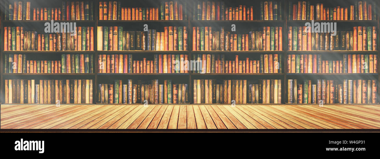 panorama blurred bookshelf Many old books in a book shop or library ...