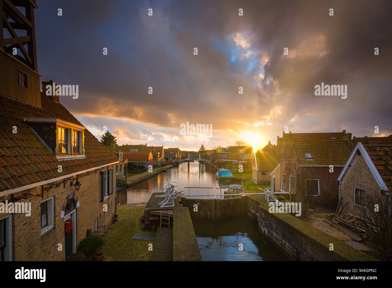 An historic town and popular travel destination in the Netherlands at the IJsselmeer with old houses and canals - Hindeloopen, The Netherlands Stock Photo