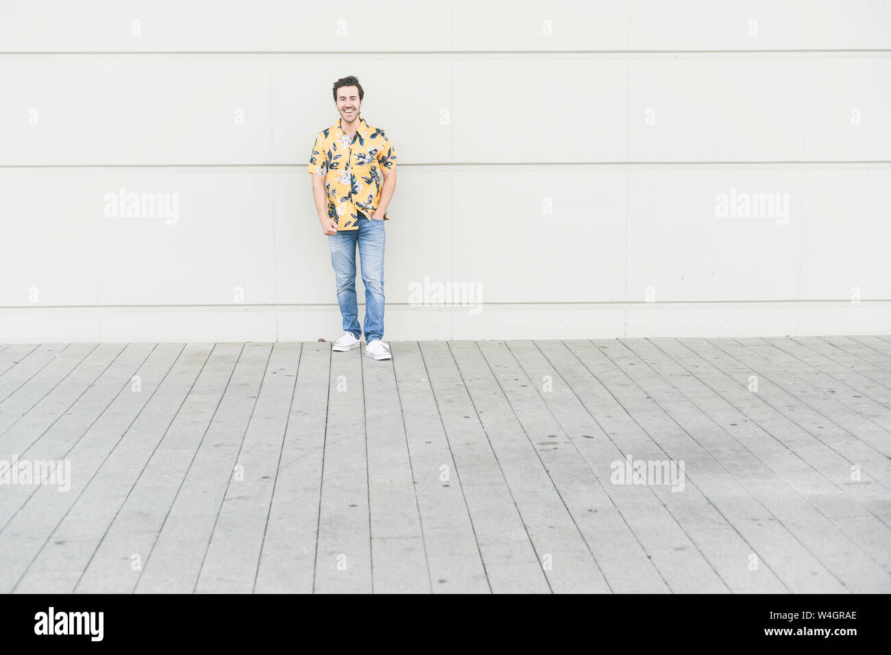 Happy young man wearing aloha shirt hi-res stock photography and images ...