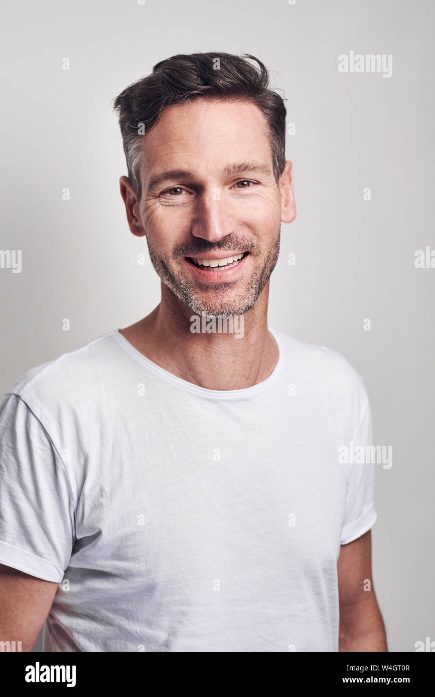 Portrait of man wearing white t-shirt Stock Photo