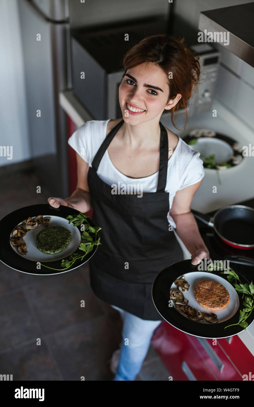 Woman holding plates hires stock photography and images Alamy