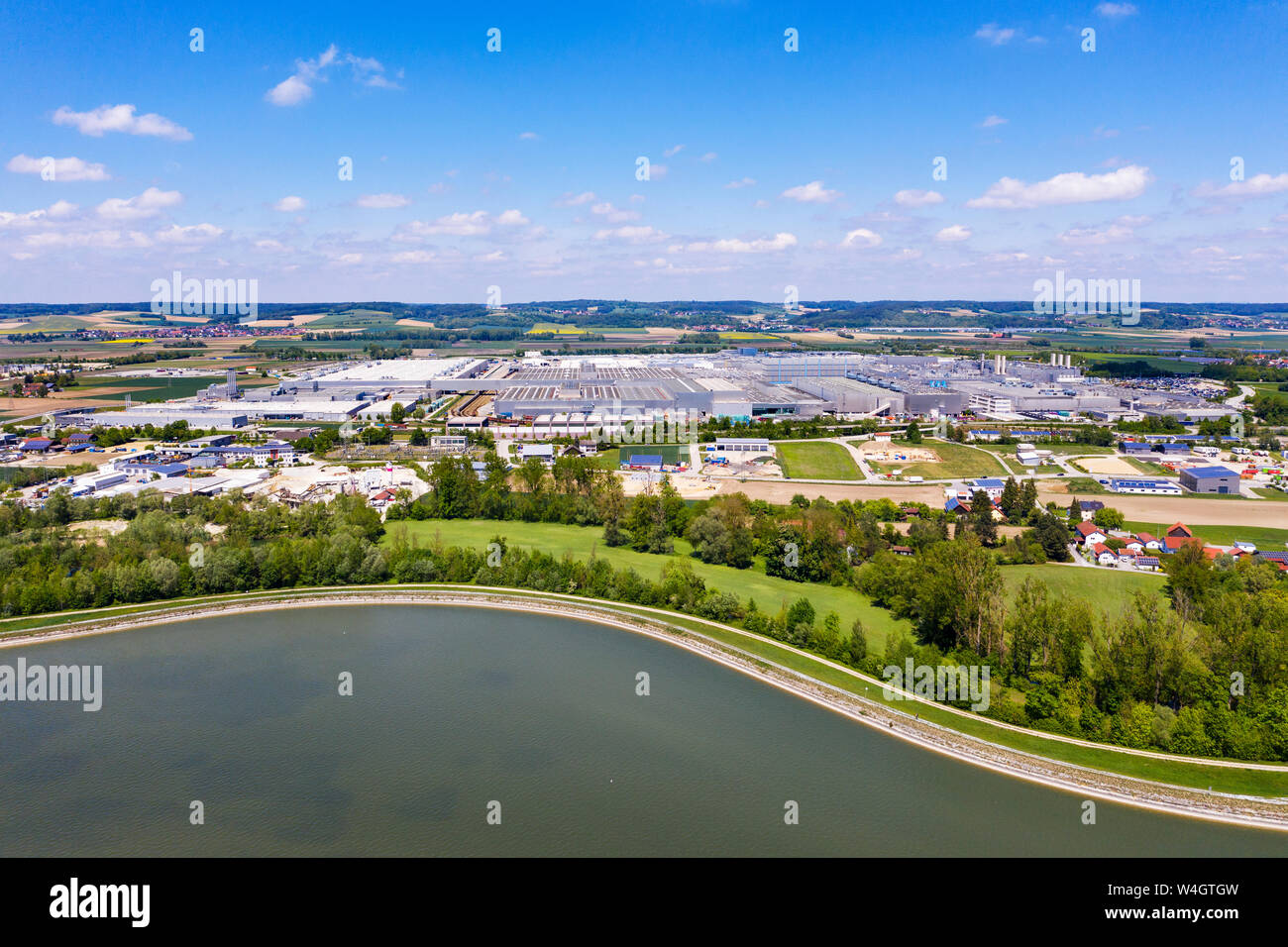 BMW plant  and Isar reservior Dingolfing, Bavaria, Germany, drone shot Stock Photo