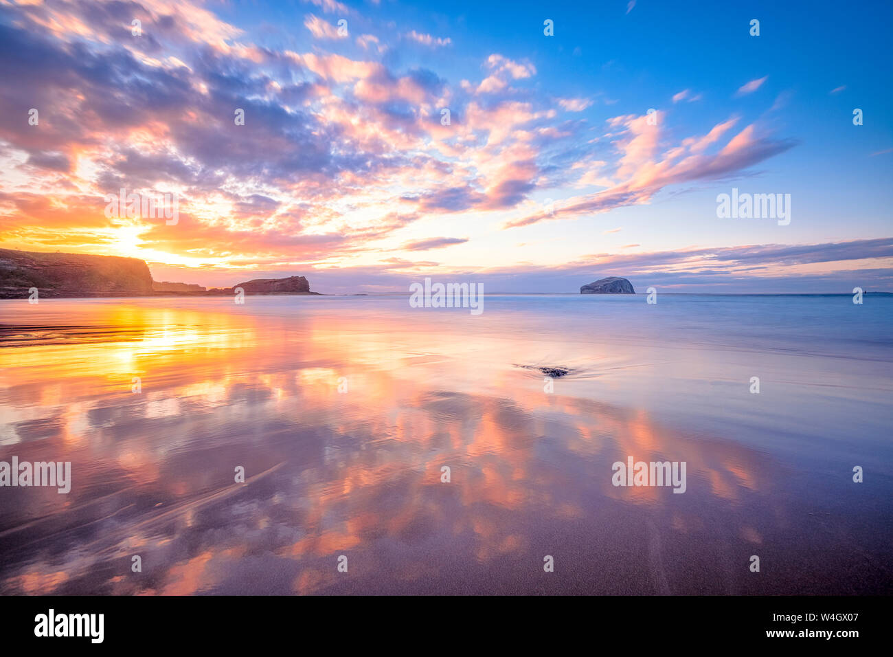 Bass Rock in distance at sunset, North Berwick, East Lothian, Scotland Stock Photo