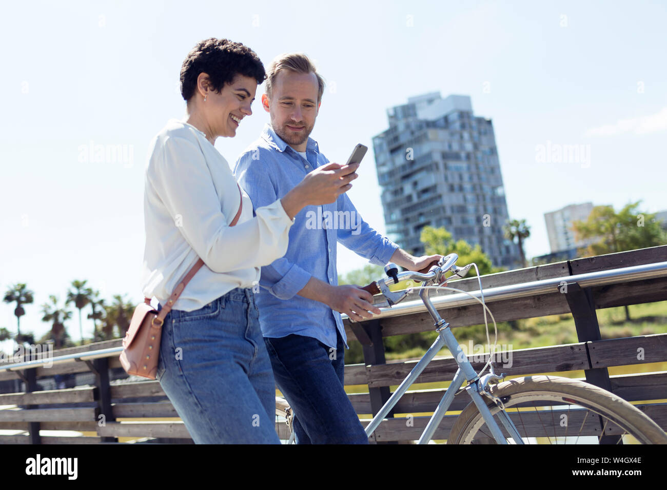 Couple with bikes in Barcelona Stock Photo