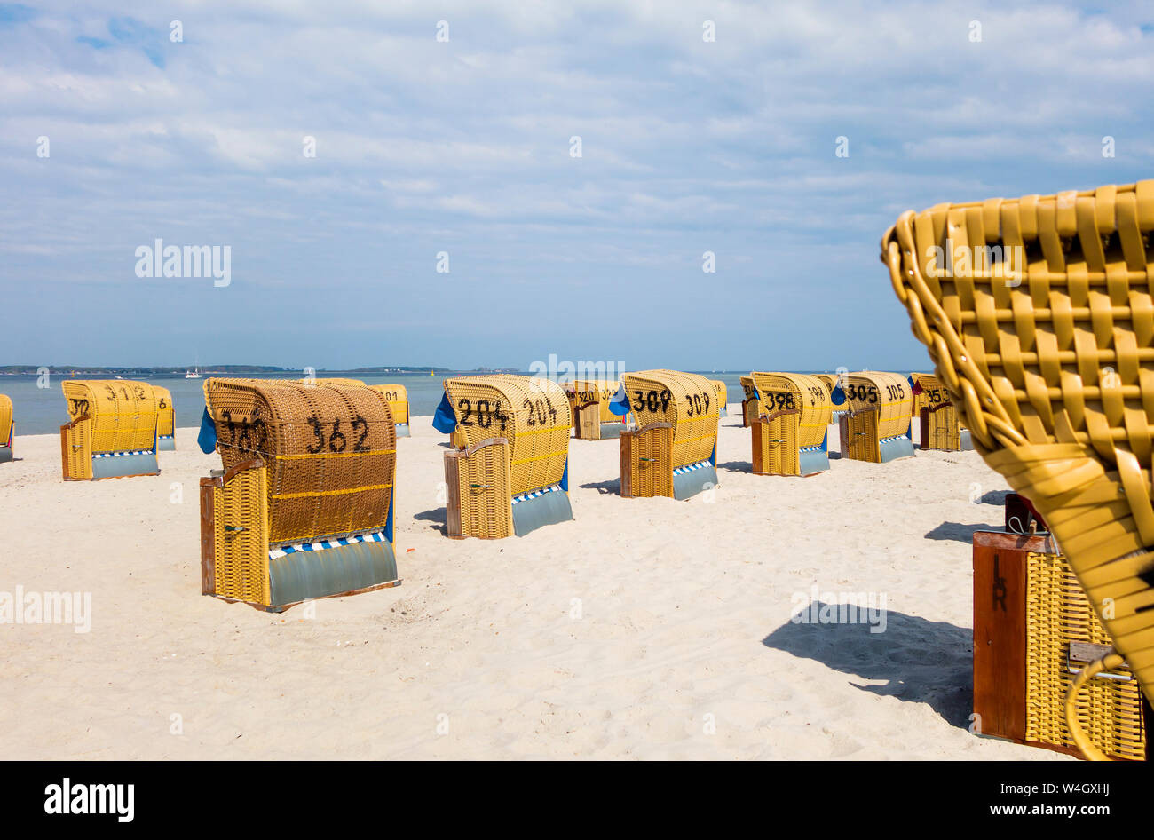Beach with hooded  beach chairs, Baltic sea seaside resort Laboe, East bank, Kieler Foerde, Schleswig-Holstein, Germany Stock Photo