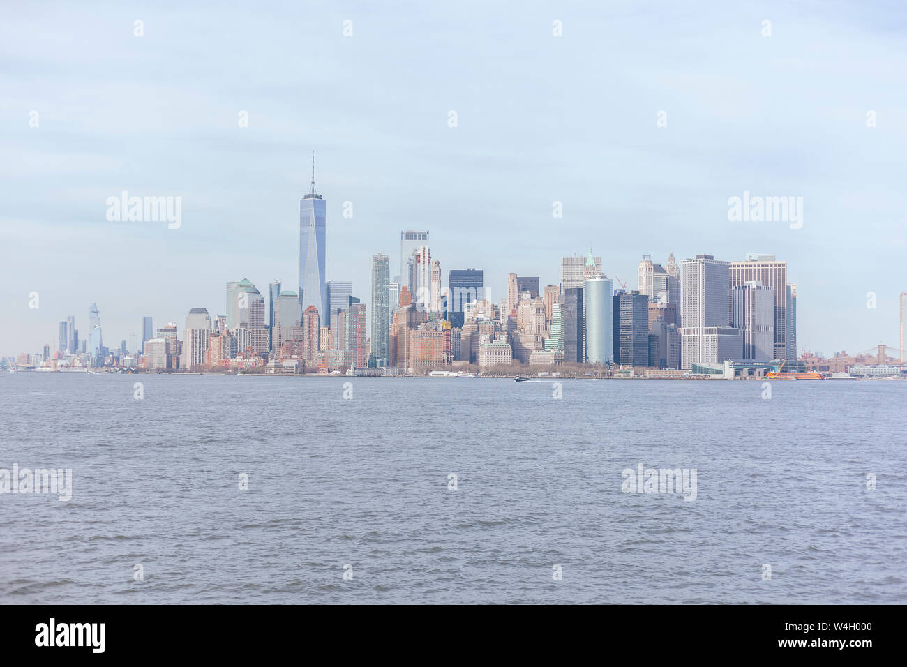 Skyline at the waterfront with One World Trade Center seen from Upper New York Bay, Manhattan, New York City, USA Stock Photo