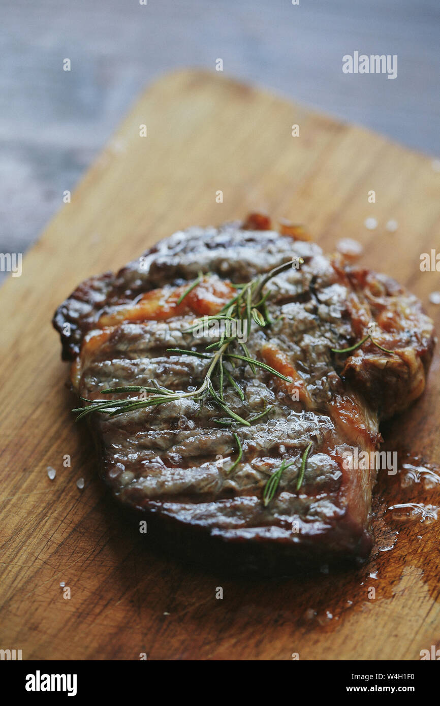 Cooking, meat preparation. Steak on the table Stock Photo