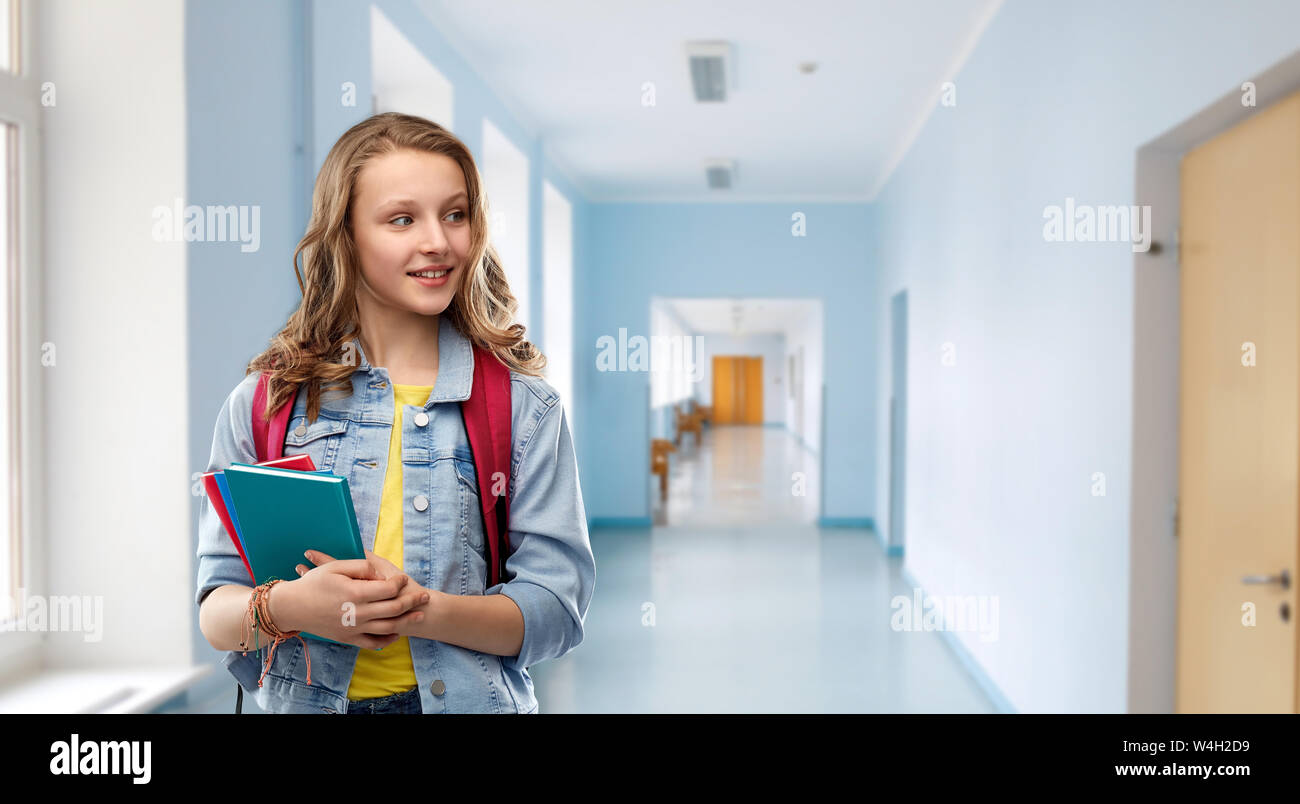 happy smiling teenage student girl with school bag Stock Photo - Alamy