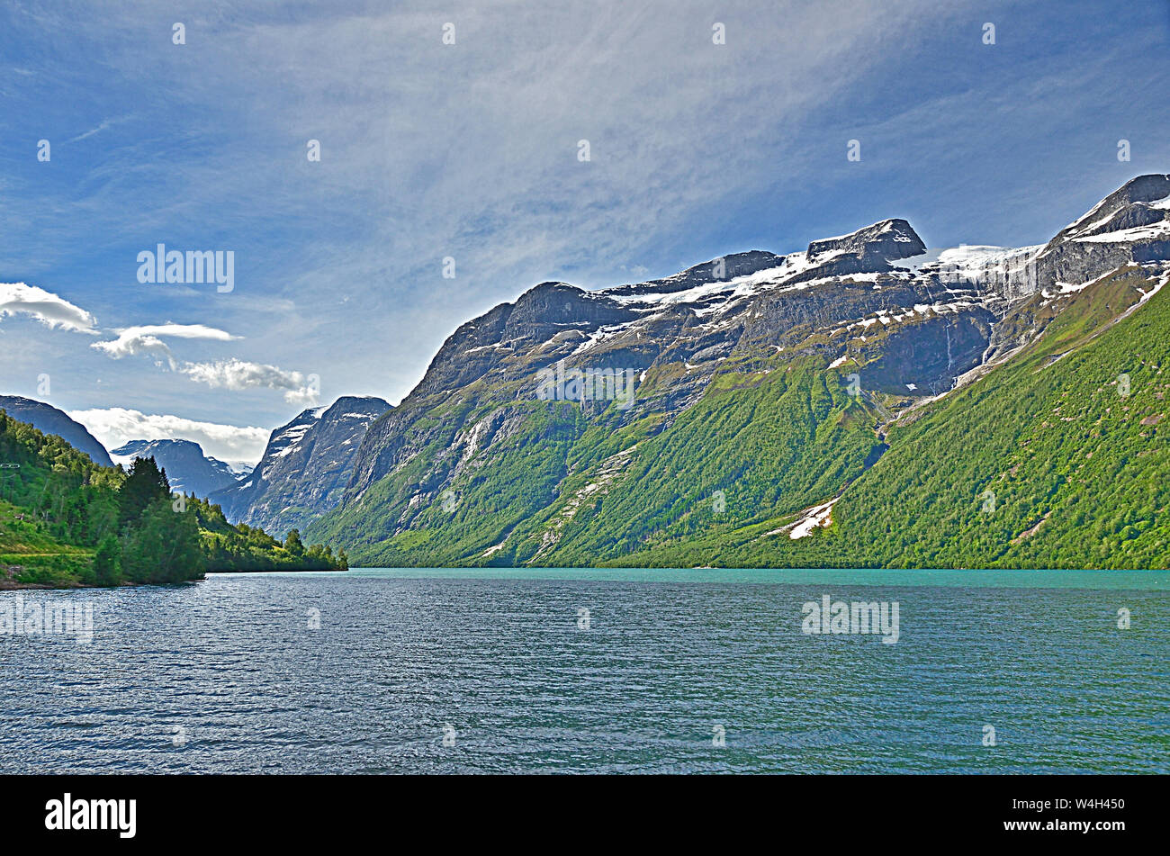 Snow-capped Mountains overlooking Nordfjord Stock Photo