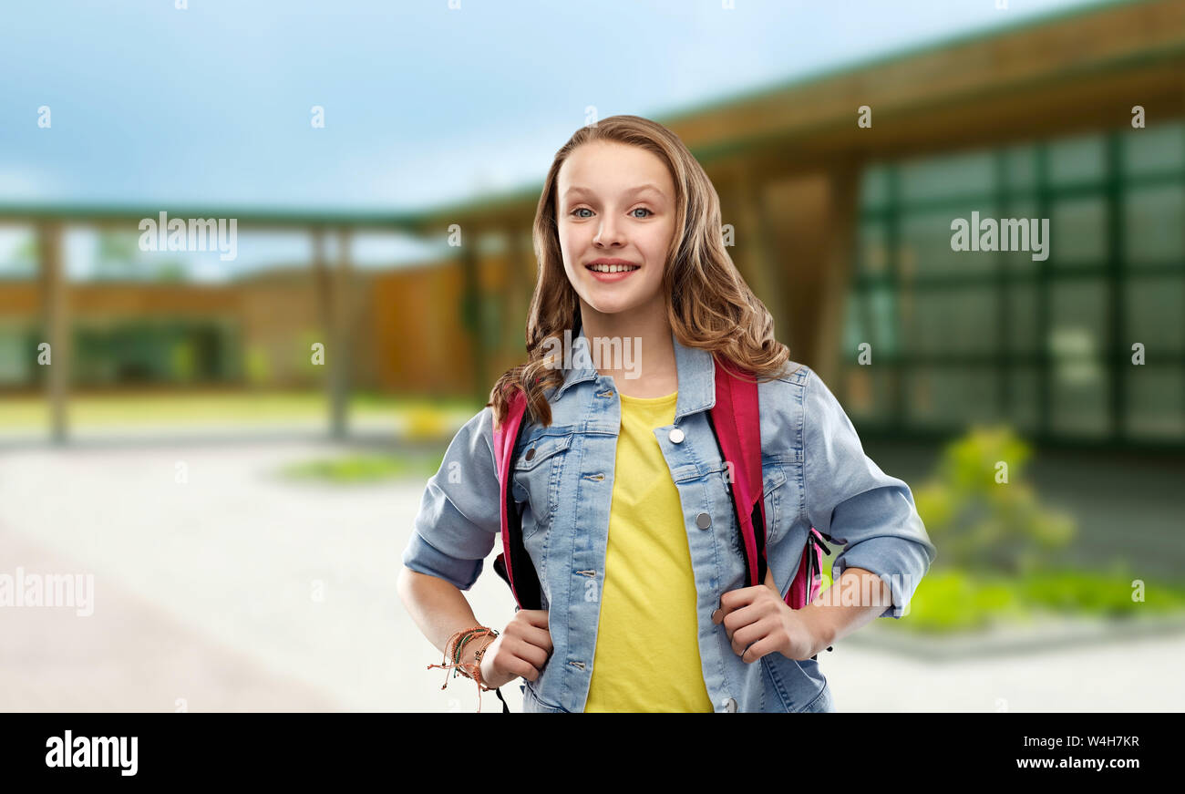 happy smiling teenage student girl with school bag Stock Photo - Alamy