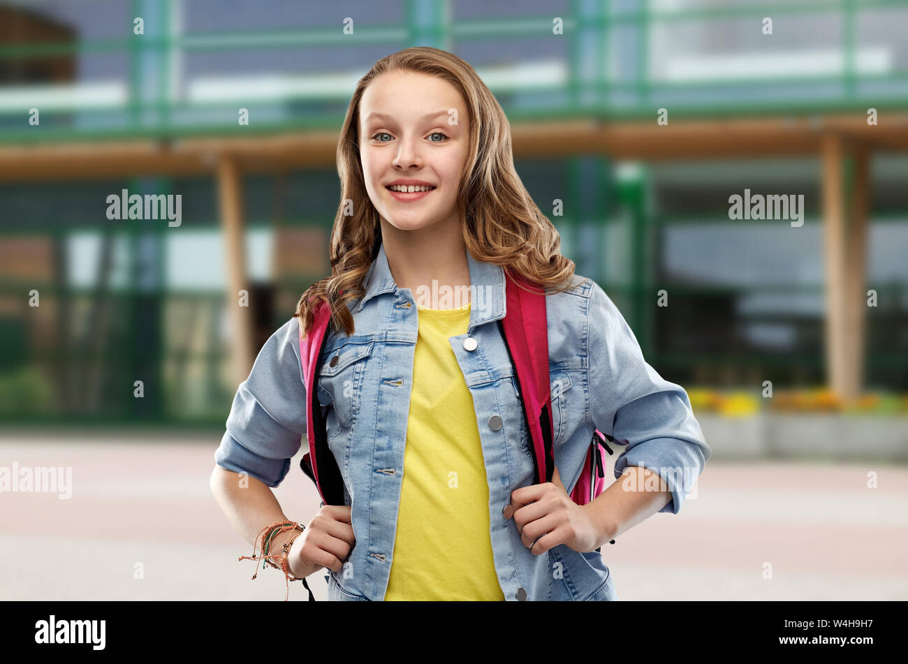happy smiling teenage student girl with school bag Stock Photo - Alamy