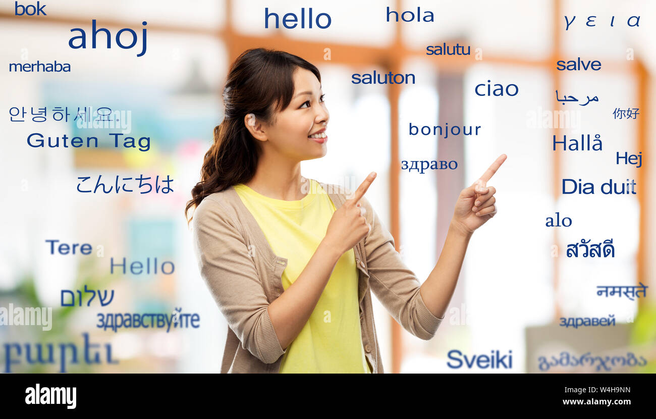 Foreigner Pointing Asian foreign hi-res stock photography and images - Alamy