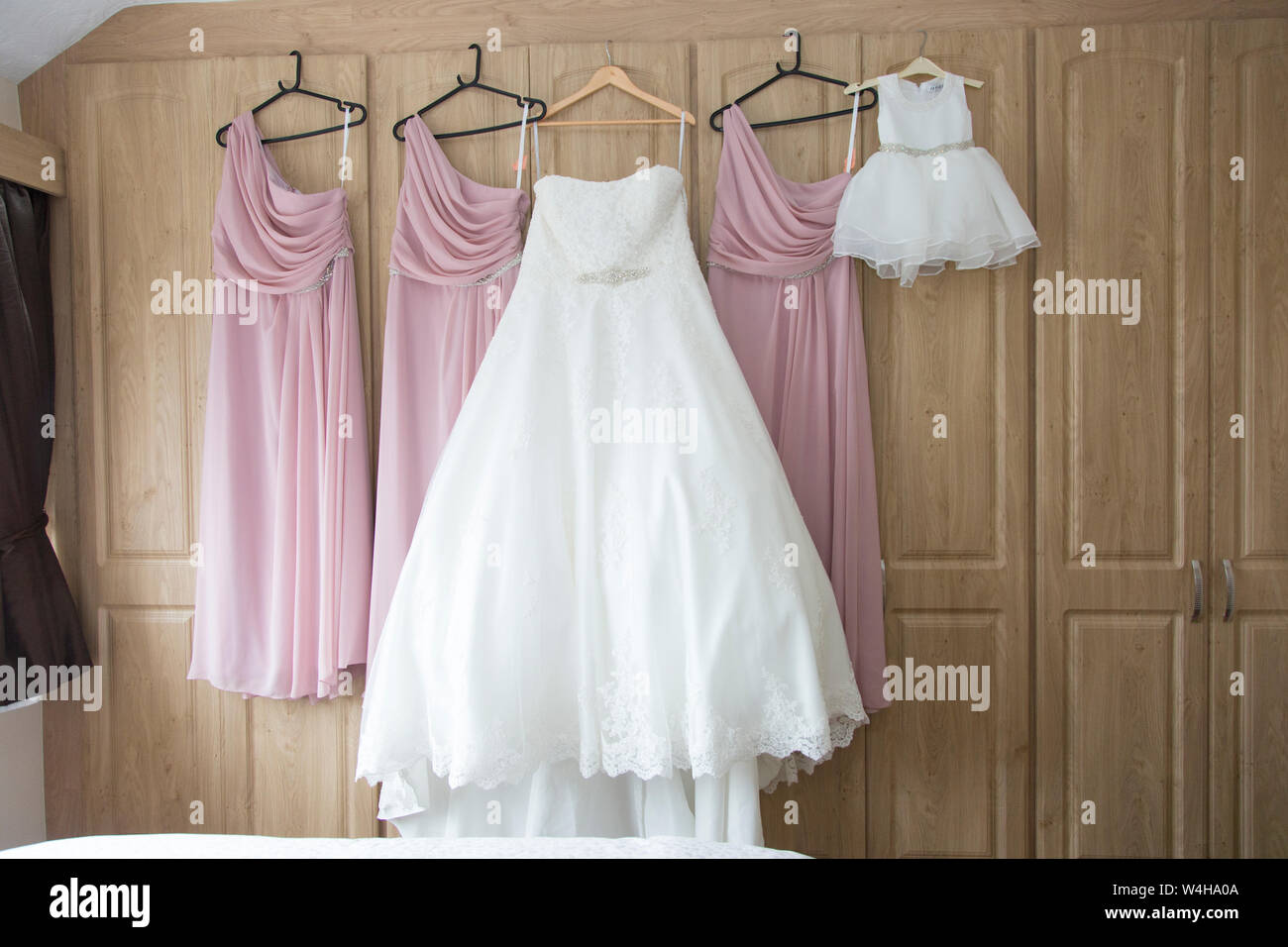 Wedding Dress hanging up waiting to be worn on the Brides wedding day ...