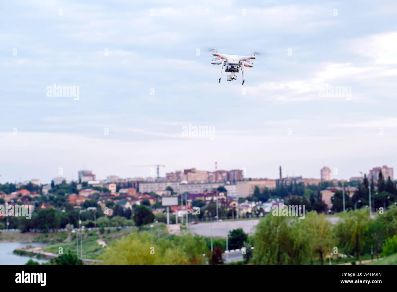 drone quad copter with high resolution digital camera flying hovering ...