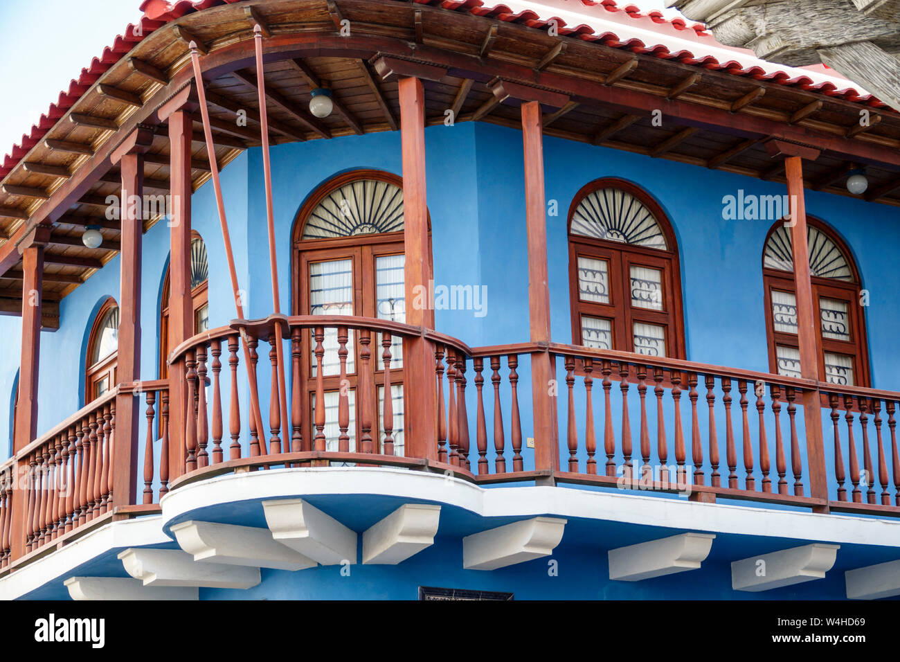 Colombia Cartagena Old Walled City Center centre historic colonial houses exterior balcony wood spindle railing restored residential apartment Stock Photo