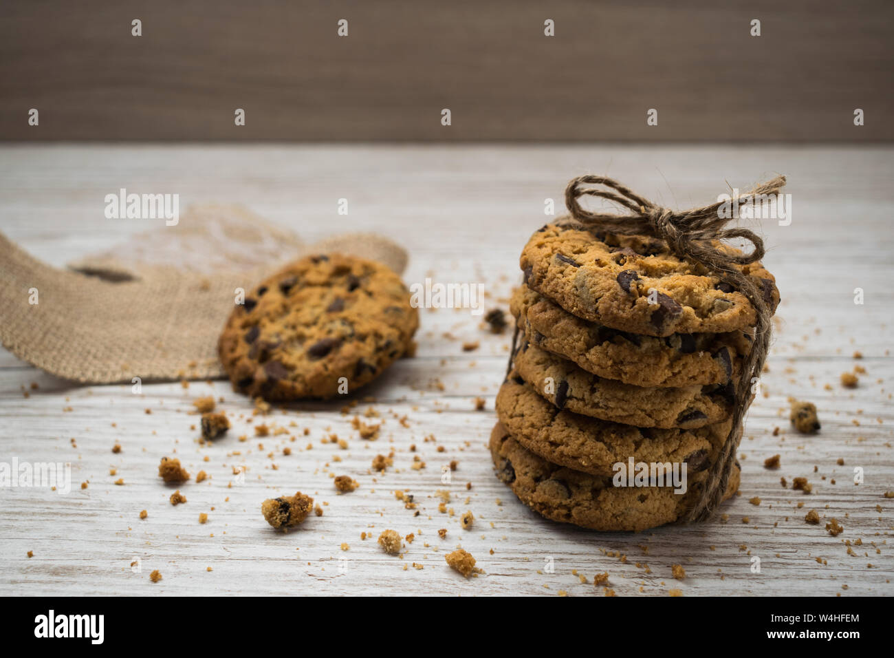 chocolate cookies and crumbs on a wooden table Stock Photo