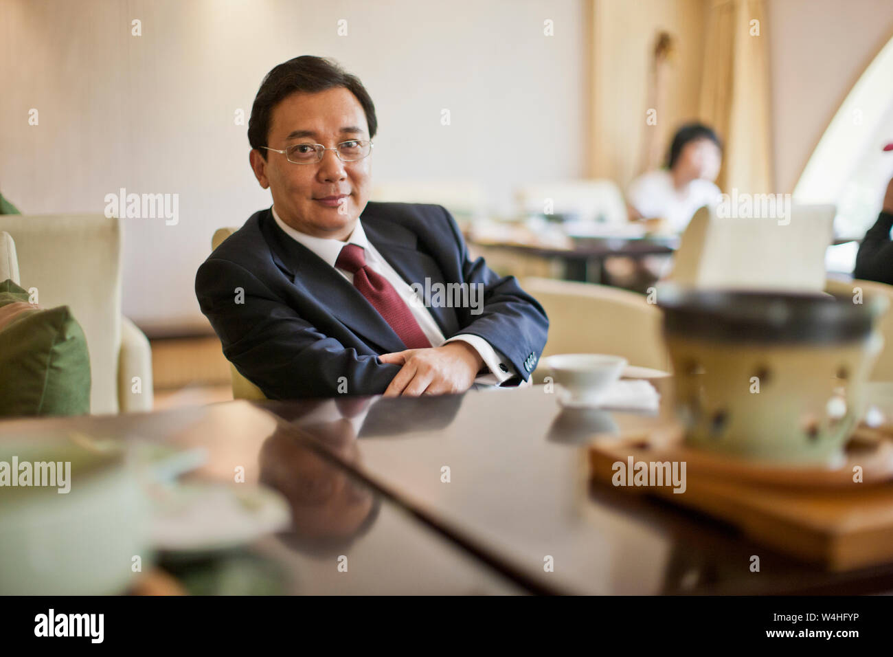 Portrait of a relaxed mature businessman. Stock Photo