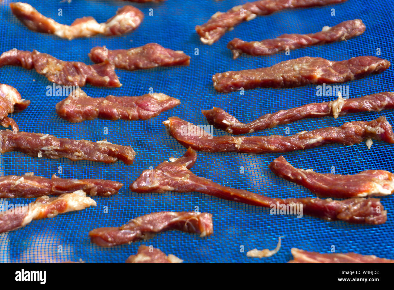 Dried meat is a feature of many cuisines around the world. Stock Photo
