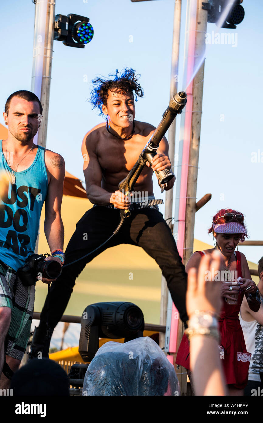 Party goes attend concert at the famous Coachella Music Festival Stock Photo