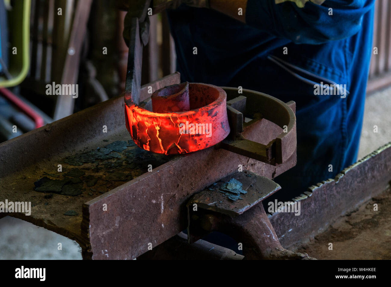blacksmith forging red-hot metal. Blacksmithing concept Stock Photo - Alamy