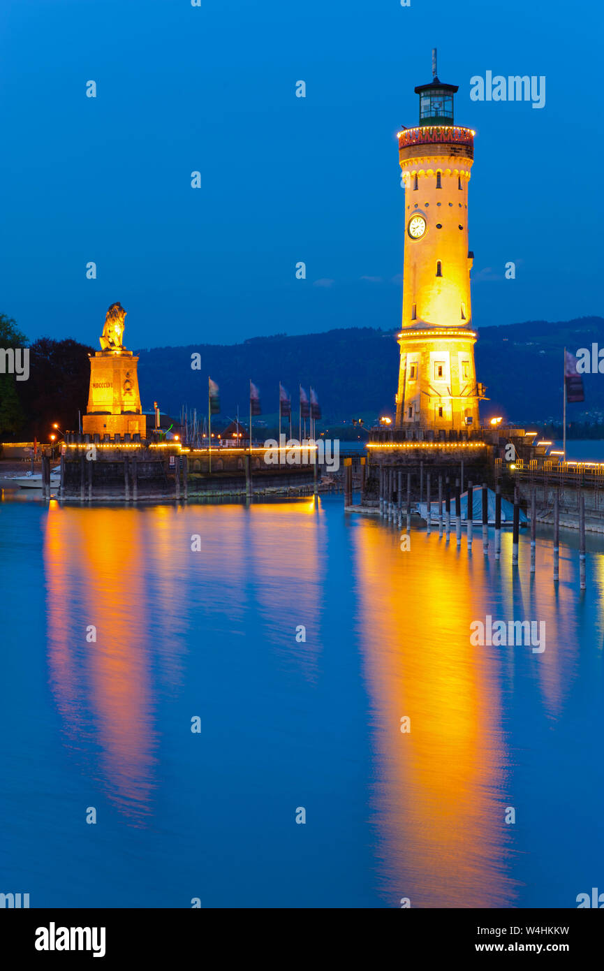 lighthouse tower at Port of city Lindau at lake Bodensee Stock Photo