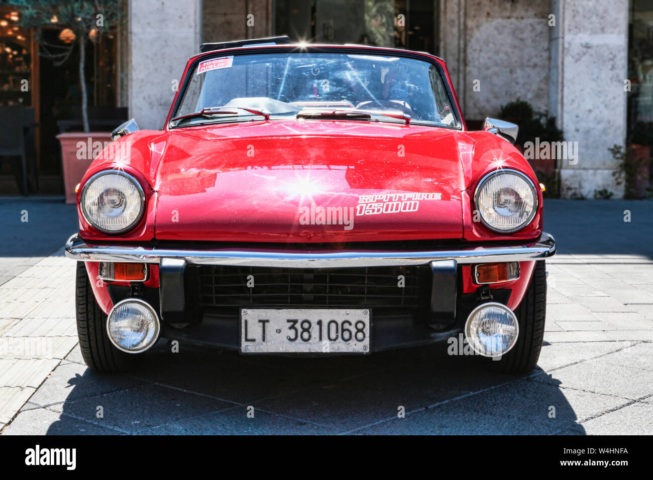 Rome,Italy - July 20, 2019:Rome capital city Rally event, an exhibition of vintage cars with the beutiful red car model Spitfire 1500 Stock Photo