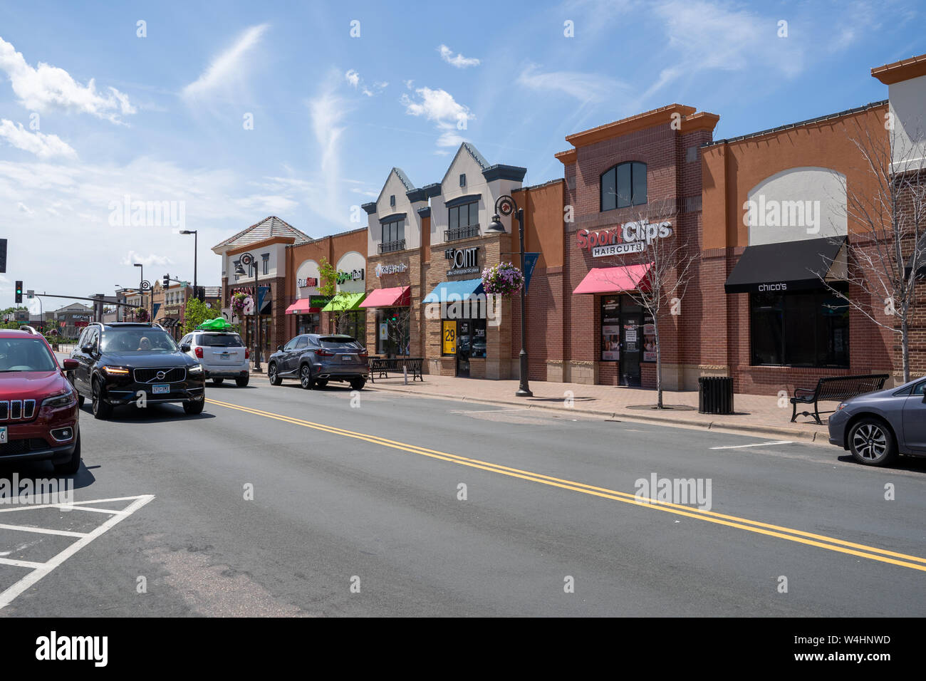 Maple Grove, Minnesota - July 21, 2019: View of the shops and restaurants of the Arbor Lakes shopping downtown area of the Minneapolis suburb in summe Stock Photo