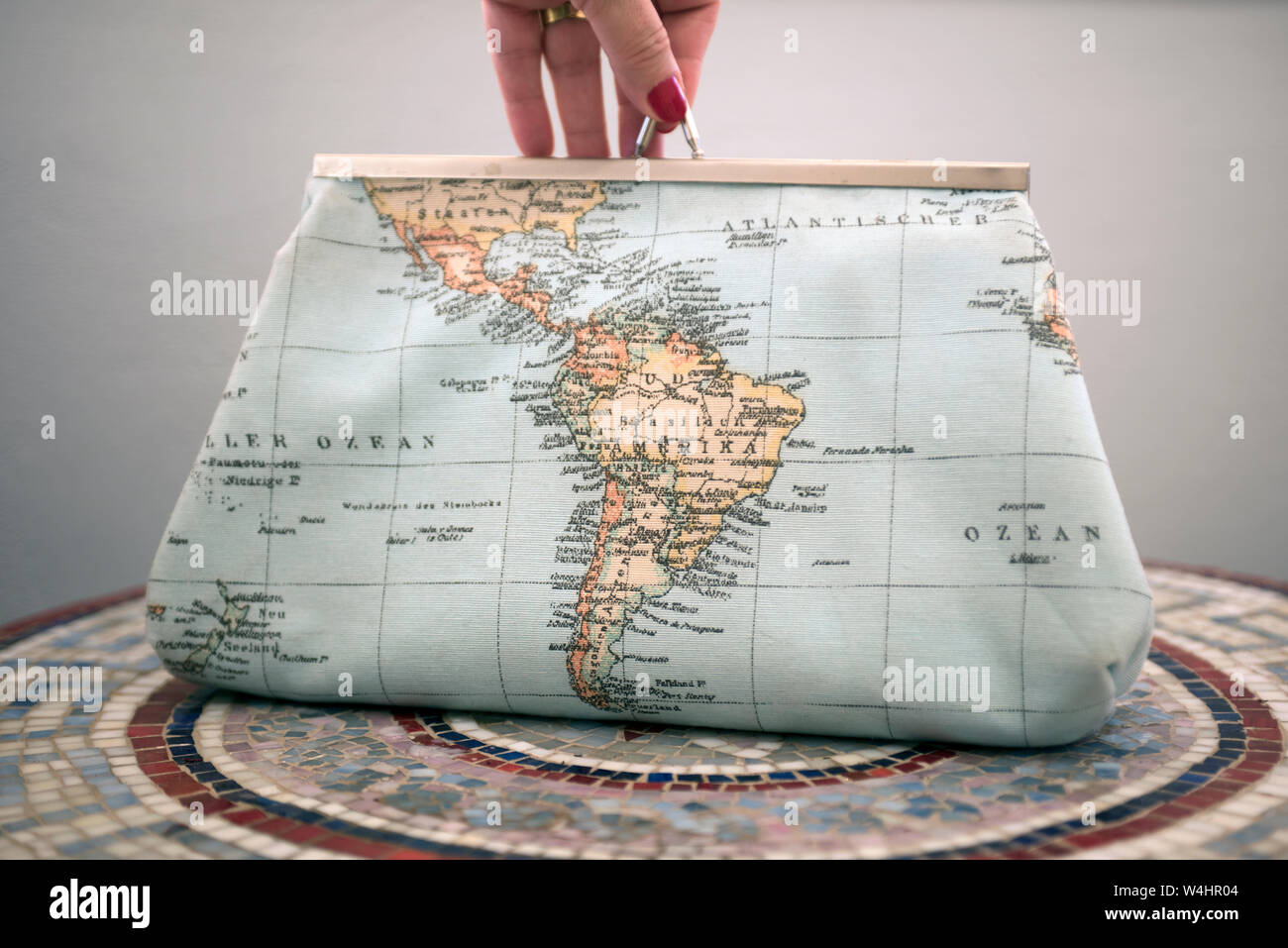 Women purse with world map design weft. Fashion design. Stock Photo