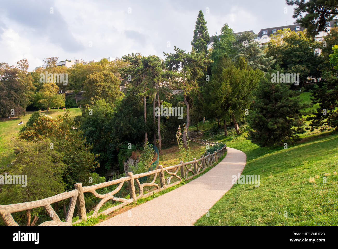 Paris, France - September 5, 2018: the Butte Chamount park  with a few people, and its beautiful scenery Stock Photo