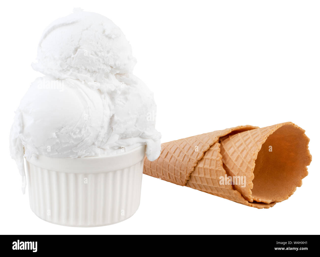 plate of vanilla ice cream scoops and waffle cones. White background