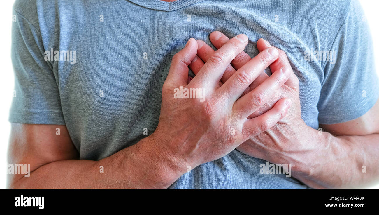 The man put his hands around the chest, pain in . Chest spasm, angina