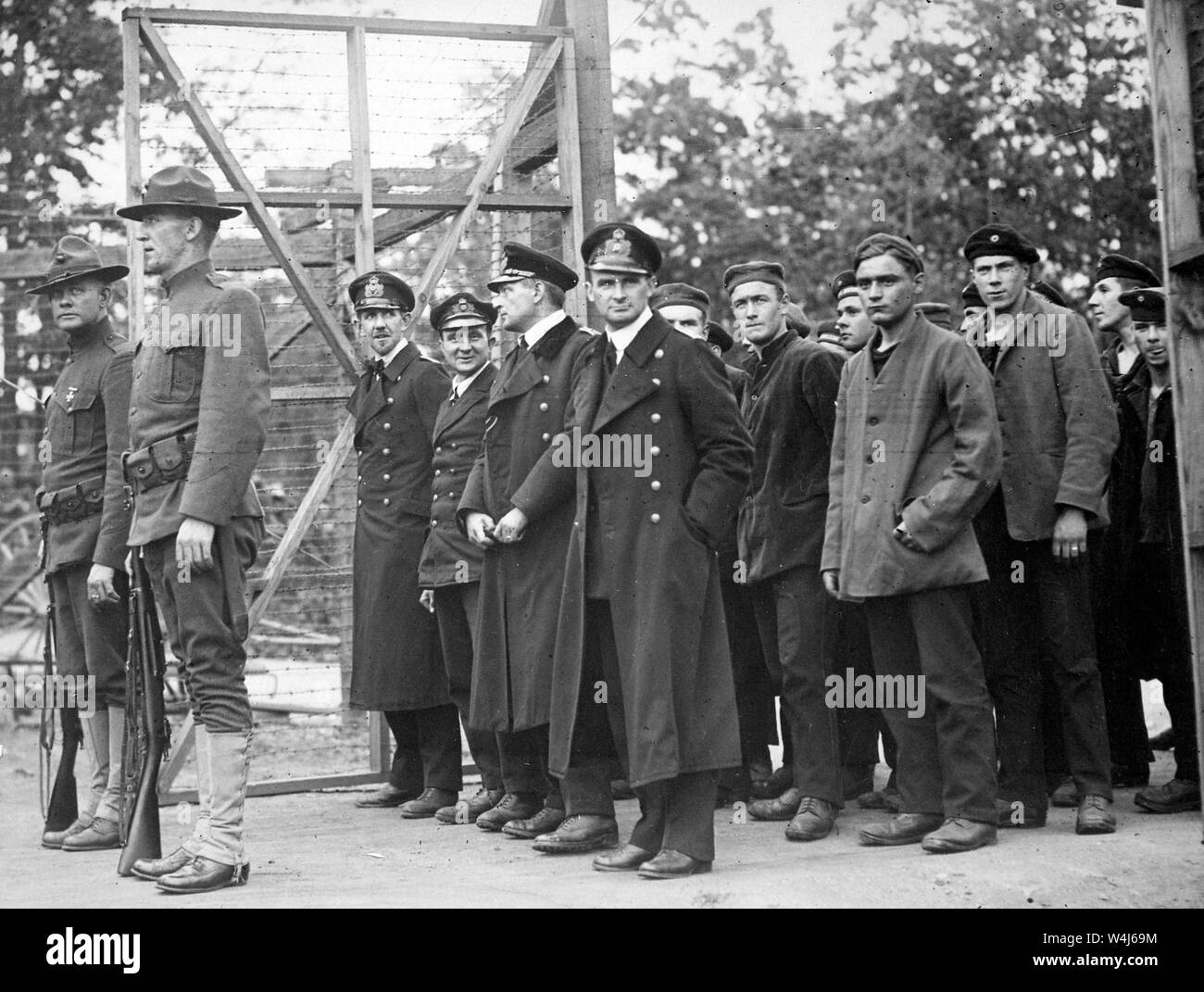 Officers and crew of the German submarine U.58, captured by the U.S.S. Fanning, entering the War Prison Camp at Fort McPherson, Georgia, USA. 1918 Stock Photo