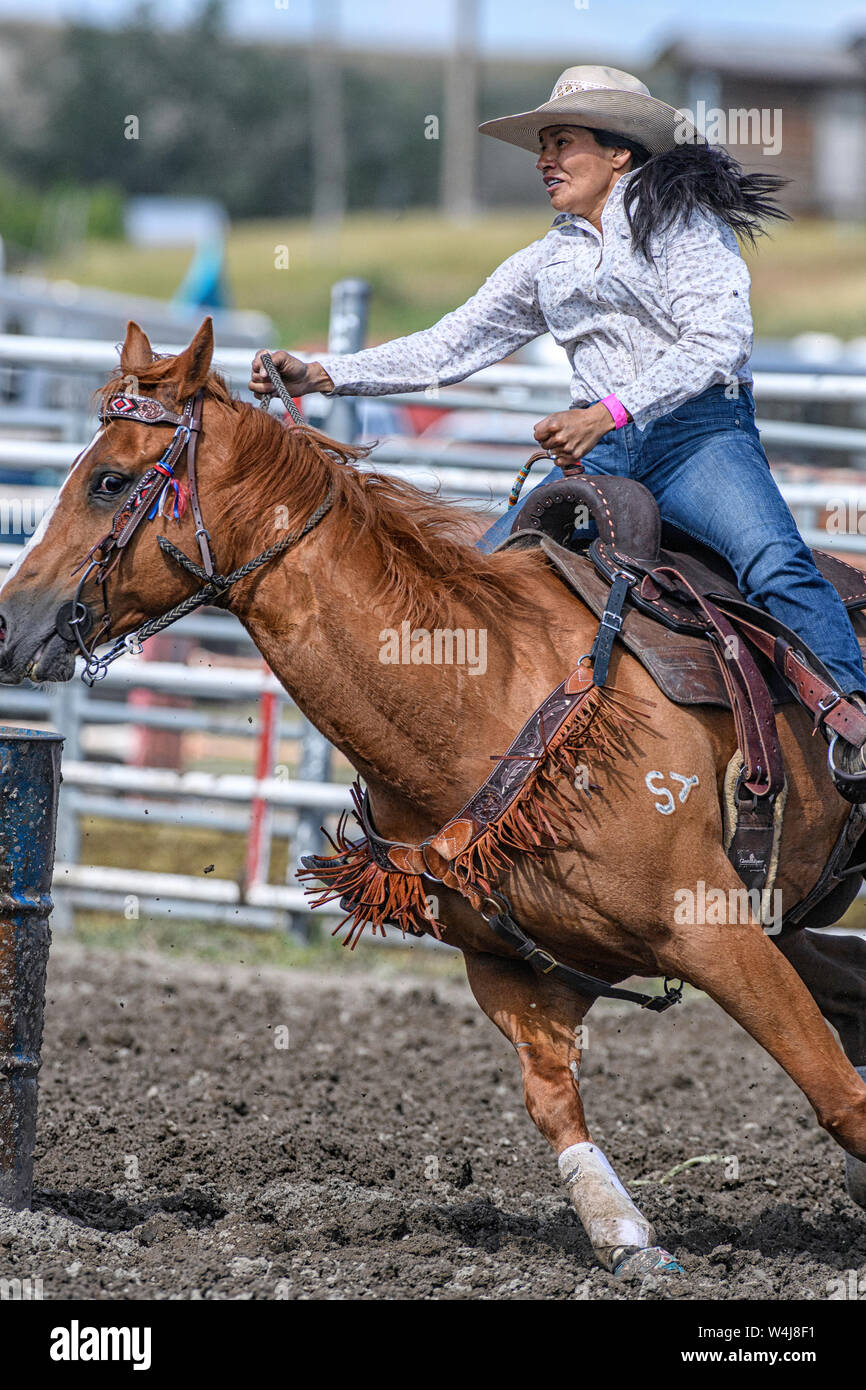 Barrel Racer at the Kainai Rodeo in Stand Off, Alberta Canada Stock
